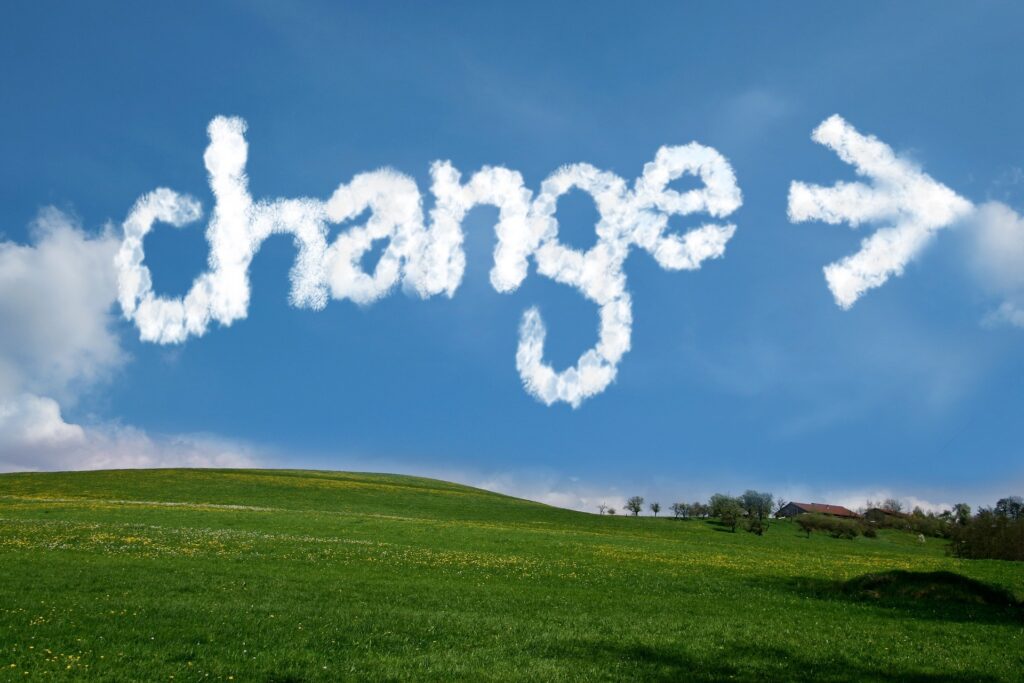 Change spelled with clouds in blue sky